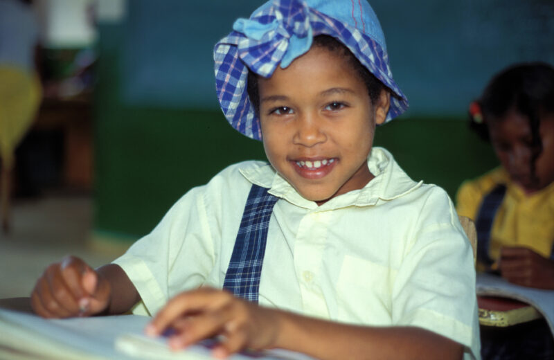 Girl in School in the Dominican Republic — International Childrens's Care in the Dominican Republic runs a christian school for the orphans they host. — Domi...