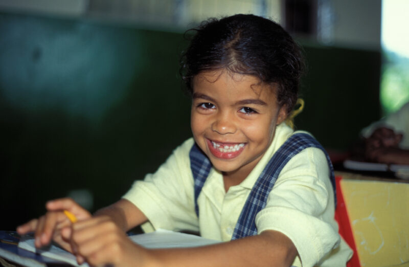 Girl in School in the Dominican Republic — International Childrens's Care in the Dominican Republic runs a christian school for the orphans they host. — Domi...