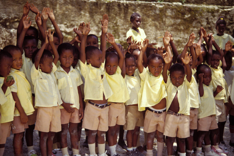 Kindergarten Students in Haiti — Cute Haitian kids do morning exercises before class, at a Kindergarten in Haiti — Haiti, children, kindergarden, school, uni...
