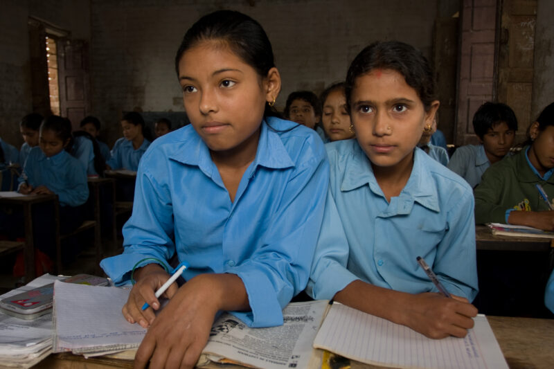 Girls in School in Nepal — Children attend school in rural Nepal, thanks to a sponsorship program run by ADRA — Nepal, students, children, elementary, school