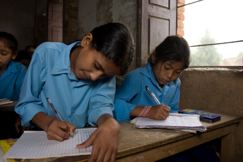 Girl In School in Nepal — Children attend school in rural Nepal, thanks to a sponsorship program run by ADRA — Nepal, students, children, elementary, school