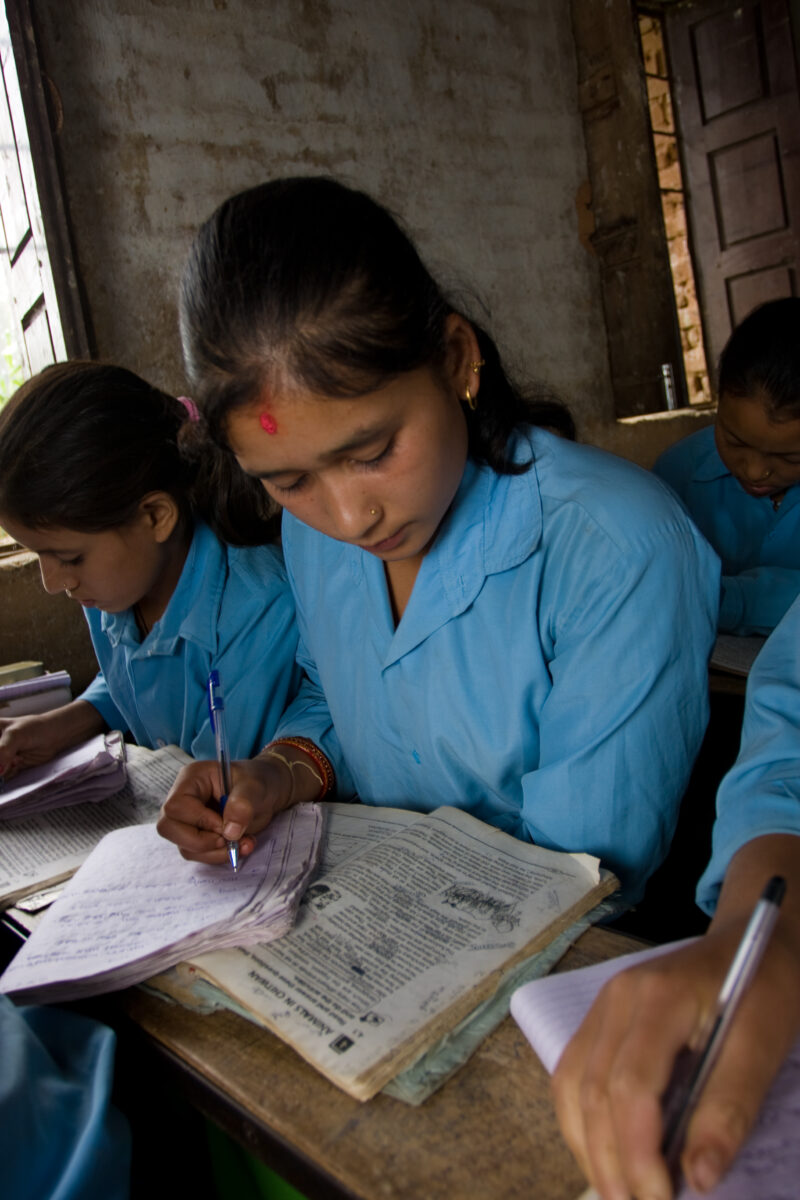Girl In School in Nepal — Children attend school in rural Nepal, thanks to a sponsorship program run by ADRA — Nepal, students, children, elementary, school