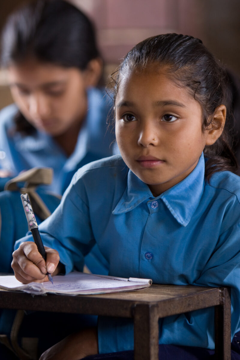 Girl In School in Nepal — Children attend school in rural Nepal, thanks to a sponsorship program run by ADRA — Nepal, students, children, elementary, school
