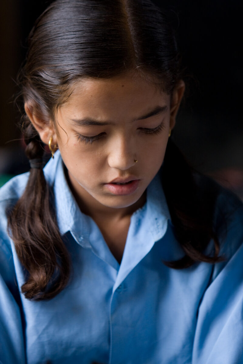 Girl In School in Nepal — Children attend school in rural Nepal, thanks to a sponsorship program run by ADRA — Nepal, students, children, elementary, school