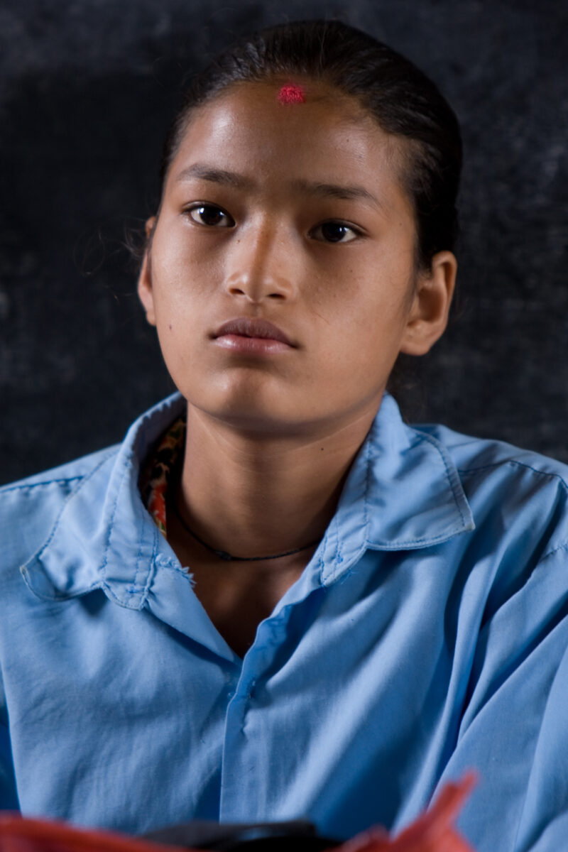Girl in School in Nepal — Children attend school in rural Nepal, thanks to a sponsorship program run by ADRA — Nepal, students, children, elementary, school