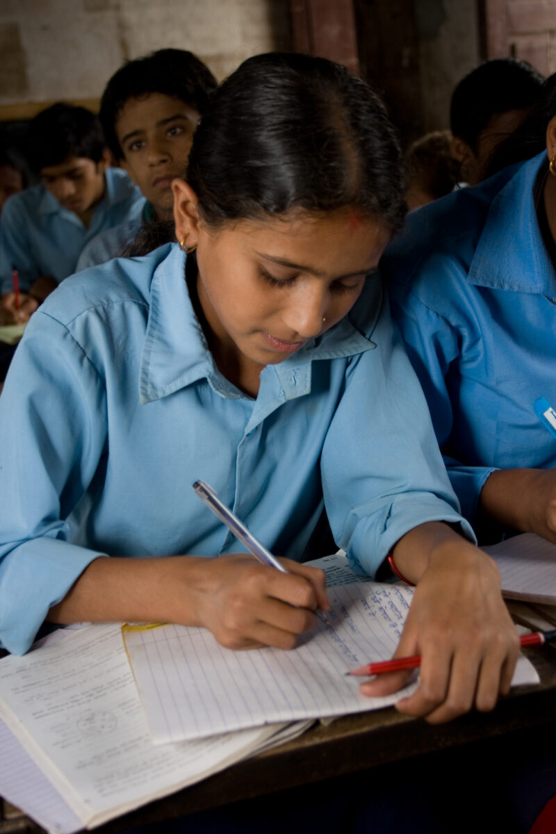 Girl in School in Nepal — Children attend school in rural Nepal, thanks to a sponsorship program run by ADRA — Nepal, students, children, elementary, school
