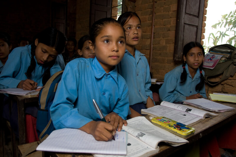 Girl in School in Nepal — Children attend school in rural Nepal, thanks to a sponsorship program run by ADRA — Nepal, students, children, elementary, school
