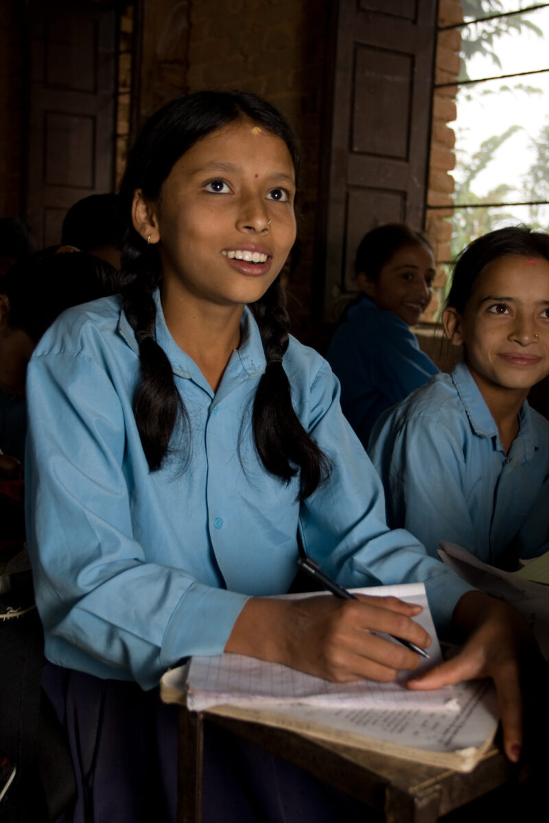 Girl in School in Nepal — Children attend school in rural Nepal, thanks to a sponsorship program run by ADRA — Nepal, students, children, elementary, school