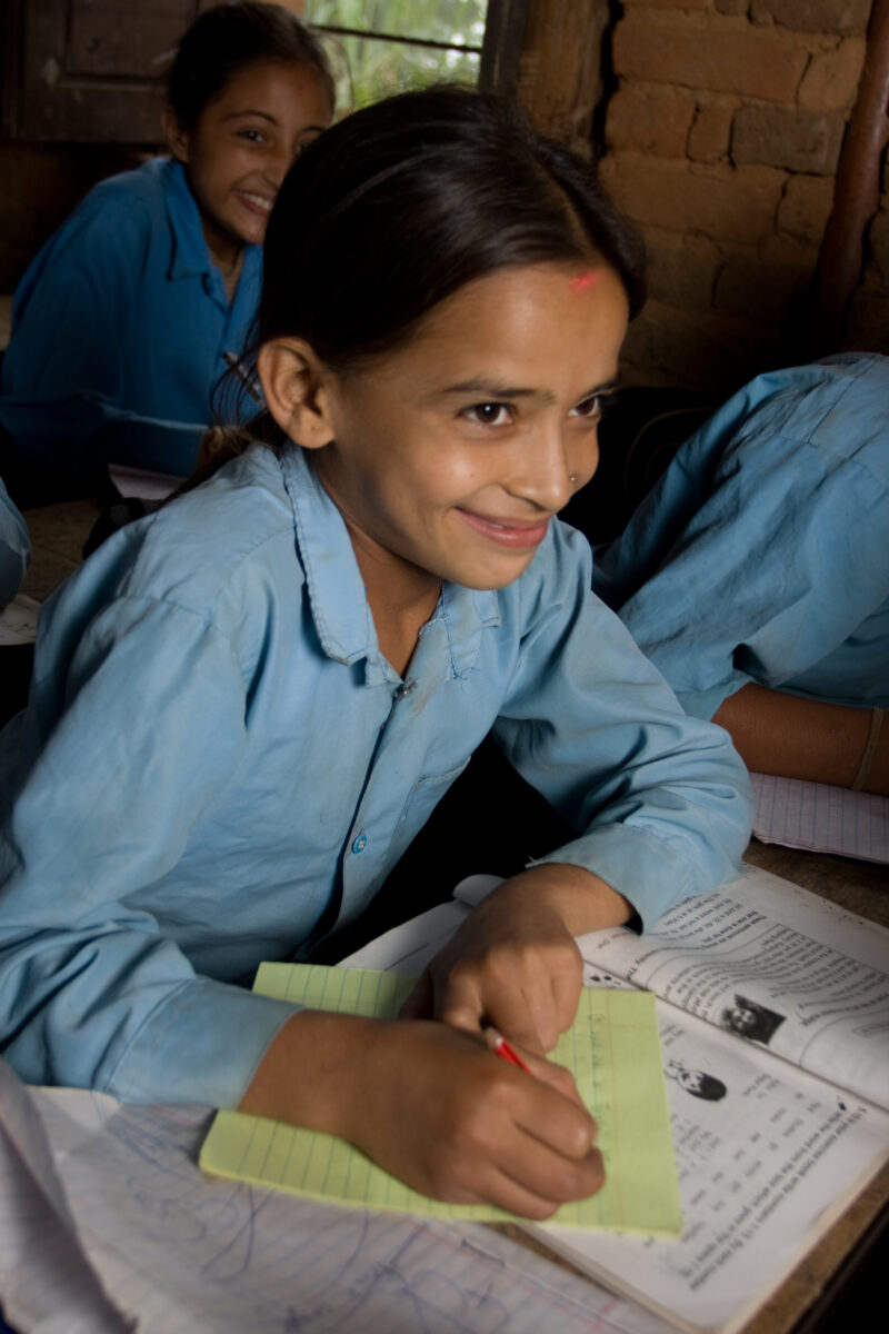 Girl in School in Nepal — Children attend school in rural Nepal, thanks to a sponsorship program run by ADRA — Nepal, students, children, elementary, school