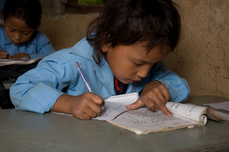 Student in Nepal School — Children attend school in rural Nepal, thanks to a sponsorship program run by ADRA — Nepal, students, children, elementary, school