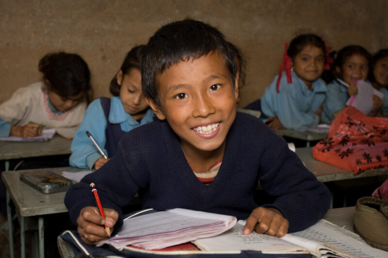 Student in Nepal School — Children attend school in rural Nepal, thanks to a sponsorship program run by ADRA — Nepal, students, children, elementary, school