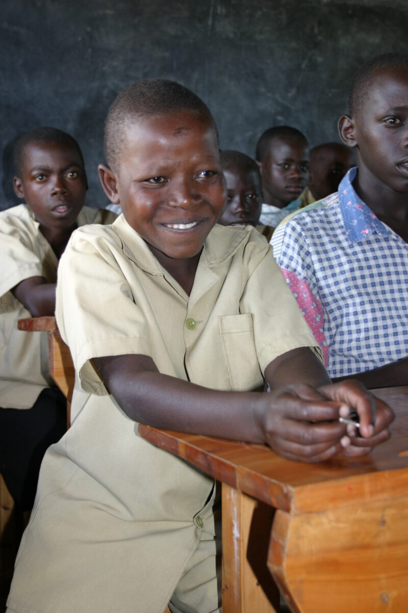 Boy in School in Rwanda — Students of refugees, returning to Rwanda after the genocide, attend schools built in a development program sponsored by ADRA and t...