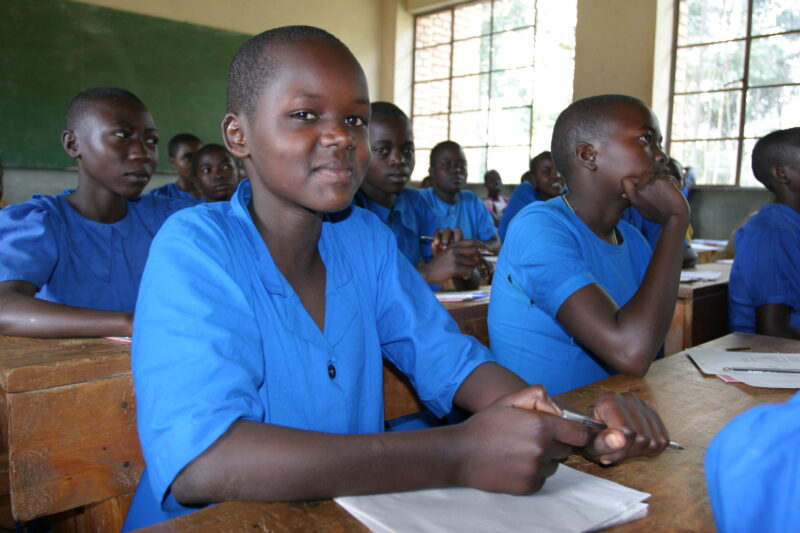 Girl in School in Rwanda — Students of refugees, returning to Rwanda after the genocide, attend schools built in a development program sponsored by ADRA and ...