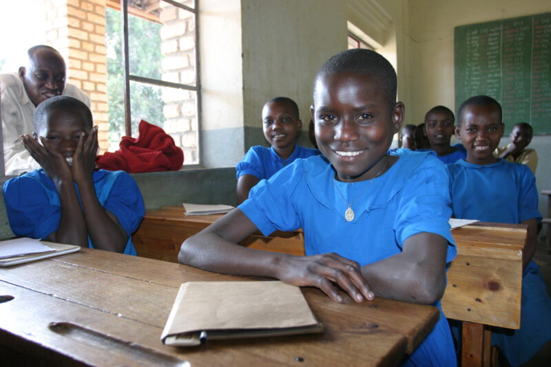 Girl in School in Rwanda — Students of refugees, returning to Rwanda after the genocide, attend schools built in a development program sponsored by ADRA and ...