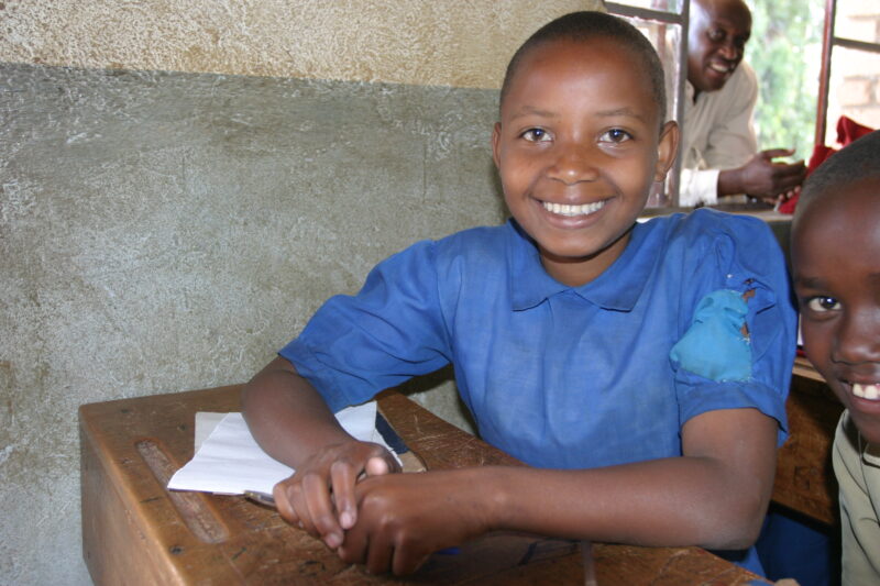 Girl in School in Rwanda — Students of refugees, returning to Rwanda after the genocide, attend schools built in a development program sponsored by ADRA and ...