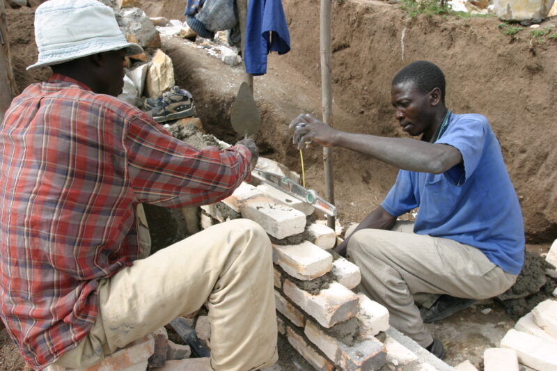 Building Schools in Rwanda — Men build schools in Rwanda on a program sponsored by CIDA and ADRA — Rwanda, Africa, ADRA, Poverty, Development