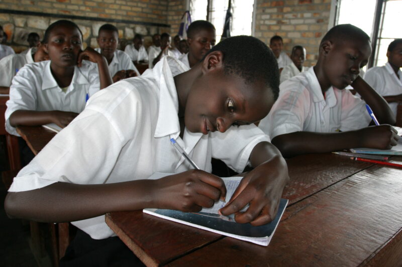 Girl in School in Rwanda — Students of refugees, returning to Rwanda after the genocide, attend schools built in a development program sponsored by ADRA and ...