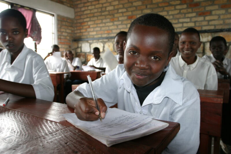 Girl in School in Rwanda — Students of refugees, returning to Rwanda after the genocide, attend schools built in a development program sponsored by ADRA and ...