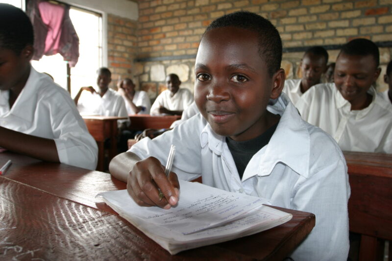 Girl in School in Rwanda — Students of refugees, returning to Rwanda after the genocide, attend schools built in a development program sponsored by ADRA and ...