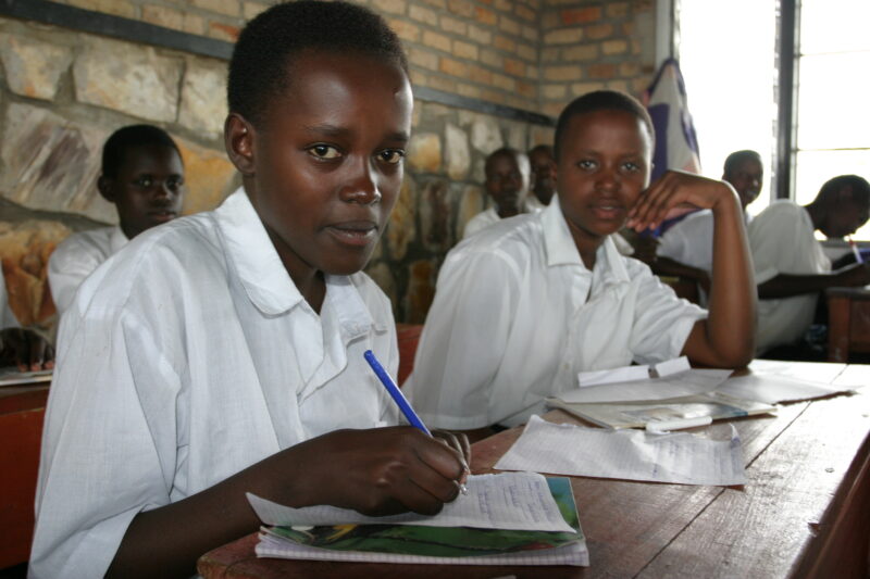 Girl in School in rwanda — Students of refugees, returning to Rwanda after the genocide, attend schools built in a development program sponsored by ADRA and ...