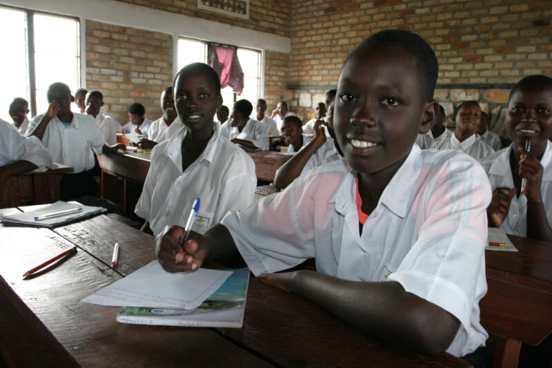 Girl in School in Rwanda — Students of refugees, returning to Rwanda after the genocide, attend schools built in a development program sponsored by ADRA and ...
