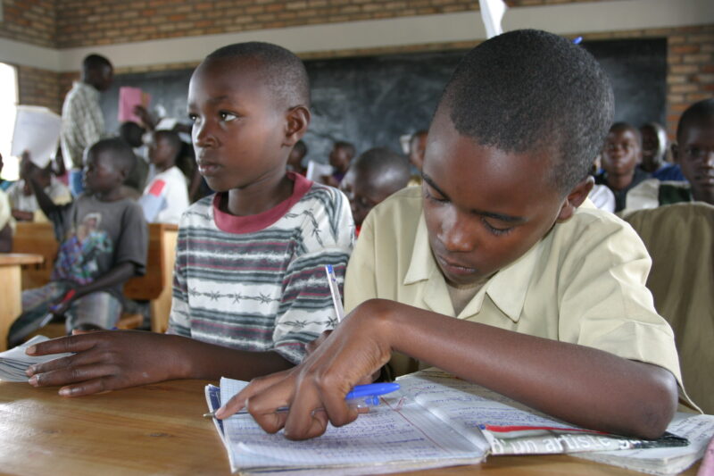 Students in School in Rwanda — Students of refugees, returning to Rwanda after the genocide, attend schools built in a development program sponsored by ADRA ...