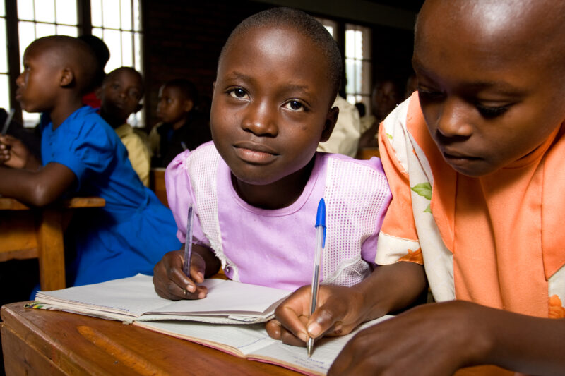 Girl in School in Rwanda — Students of refugees, returning to Rwanda after the genocide, attend schools built in a development program sponsored by ADRA and ...
