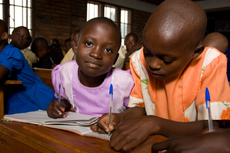Girl in School in Rwanda — Students of refugees, returning to Rwanda after the genocide, attend schools built in a development program sponsored by ADRA and ...