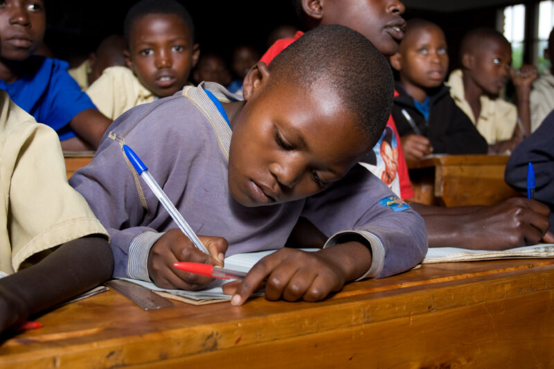 Boy in School in rwanda — Students of refugees, returning to Rwanda after the genocide, attend schools built in a development program sponsored by ADRA and t...