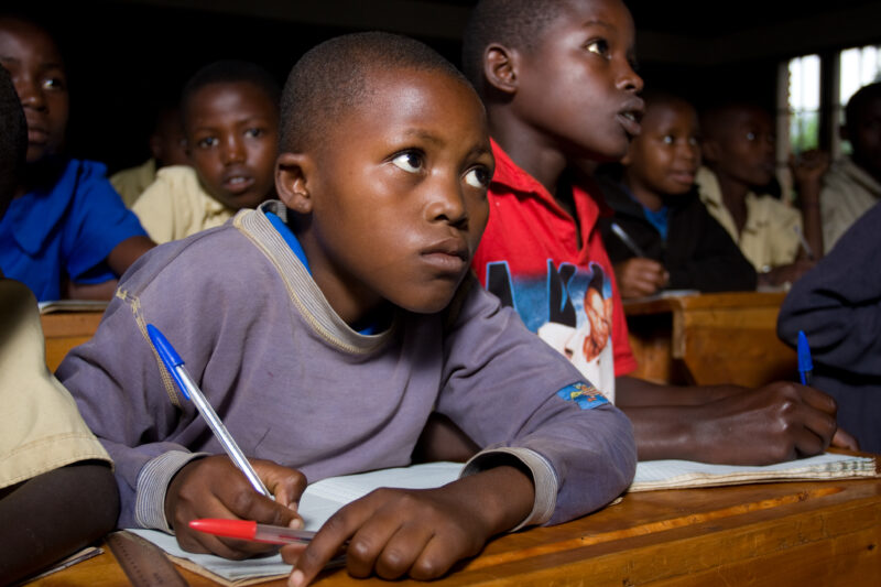Boy in School in rwanda — Students of refugees, returning to Rwanda after the genocide, attend schools built in a development program sponsored by ADRA and t...