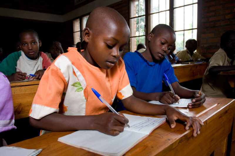 Girl in School in Rwanda — Students of refugees, returning to Rwanda after the genocide, attend schools built in a development program sponsored by ADRA and ...
