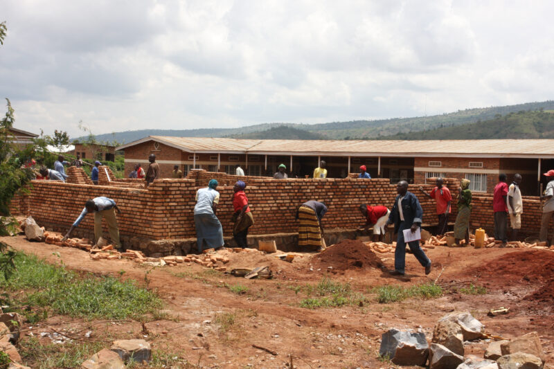 Building Classrooms in Rwanda — Villagers come out to help build more classrooms for their ADRA supported School in A CIDA development program — Africa, Rwan...