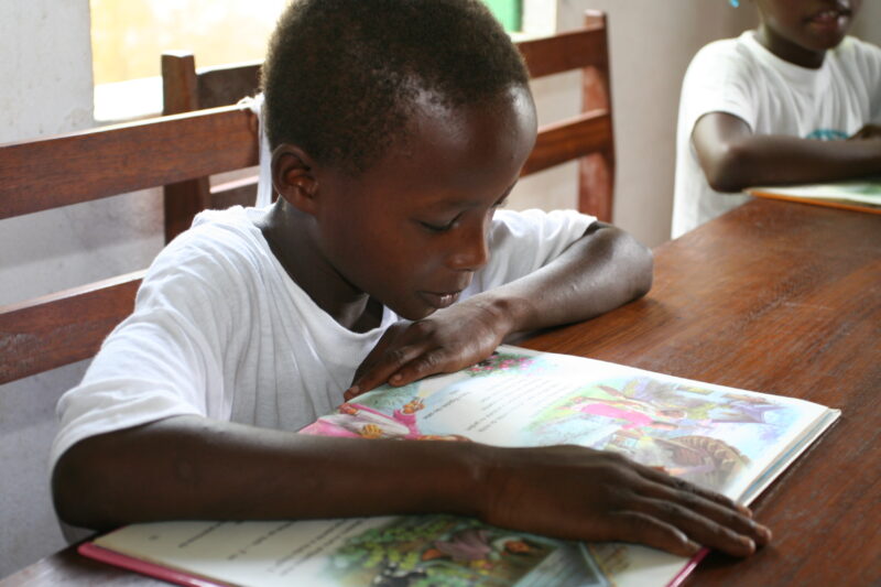 Reading in School in Africa — Eager students attend school, with help from ADRA, in Sau Tome, Africa — Sao Tome, Africa, ADRA, Poverty, ADRA Kids