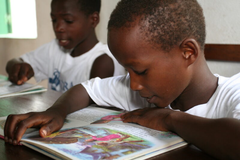 Reading in School in Africa — Eager students attend school, with help from ADRA, in Sau Tome, Africa — Sao Tome, Africa, ADRA, Poverty, ADRA Kids