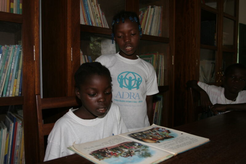 Reading in School in Africa — Eager students attend school, with help from ADRA, in Sau Tome, Africa — Sao Tome, Africa, ADRA, Poverty, ADRA Kids