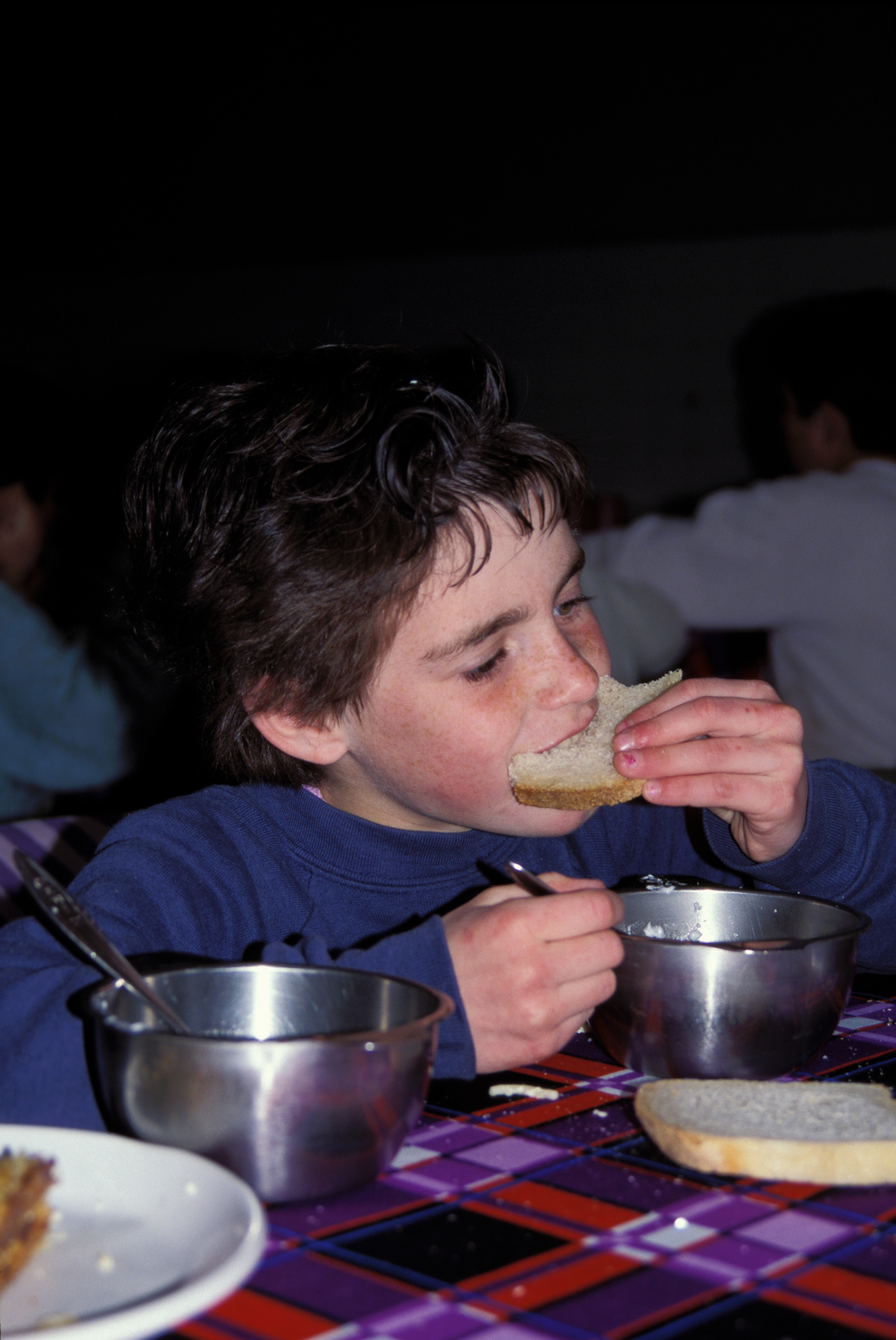 Orphans in Bosnia Eat Food provided by Canadian farmers.