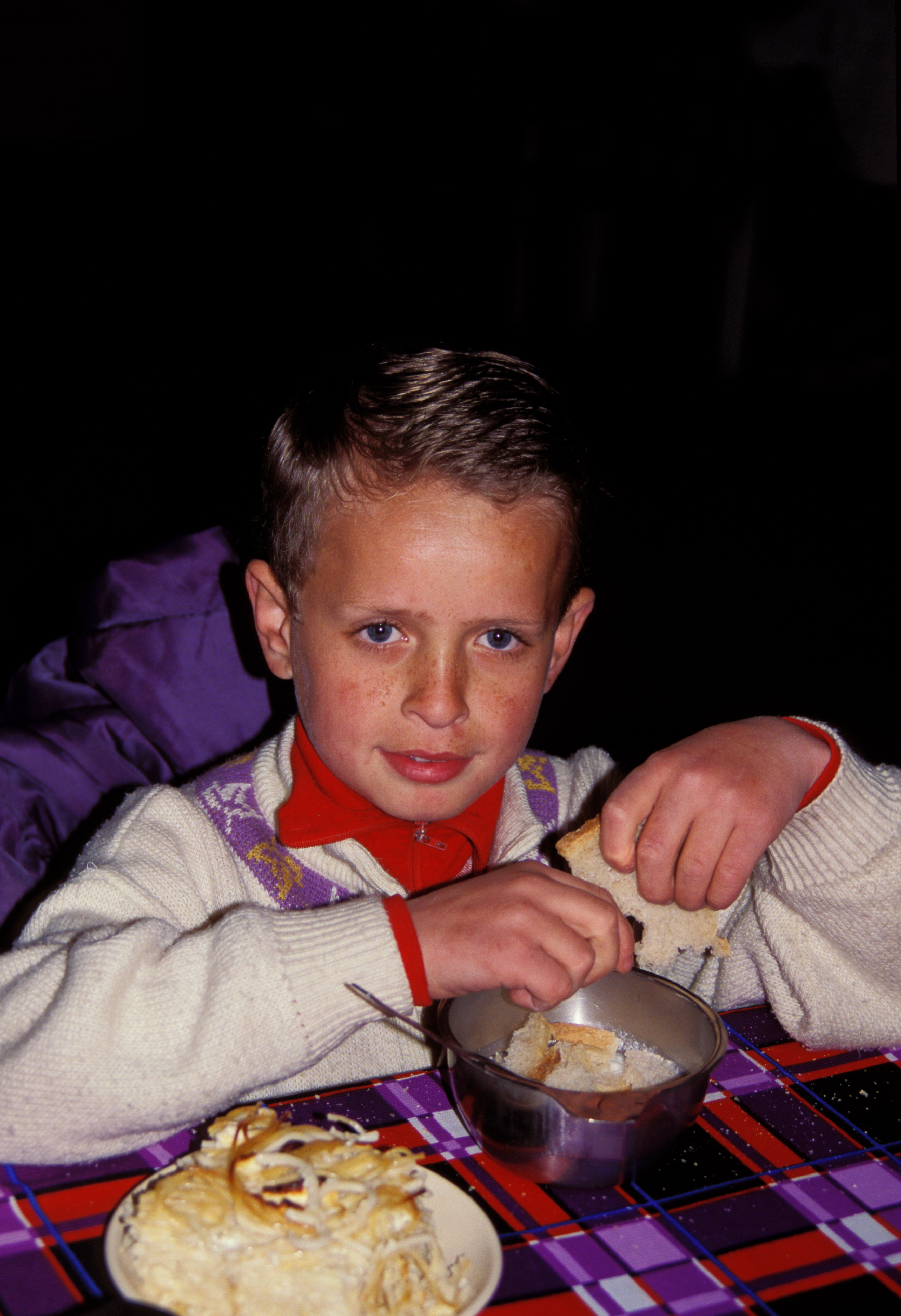 Orphans in Bosnia Eat Food provided by Canadian farmers.