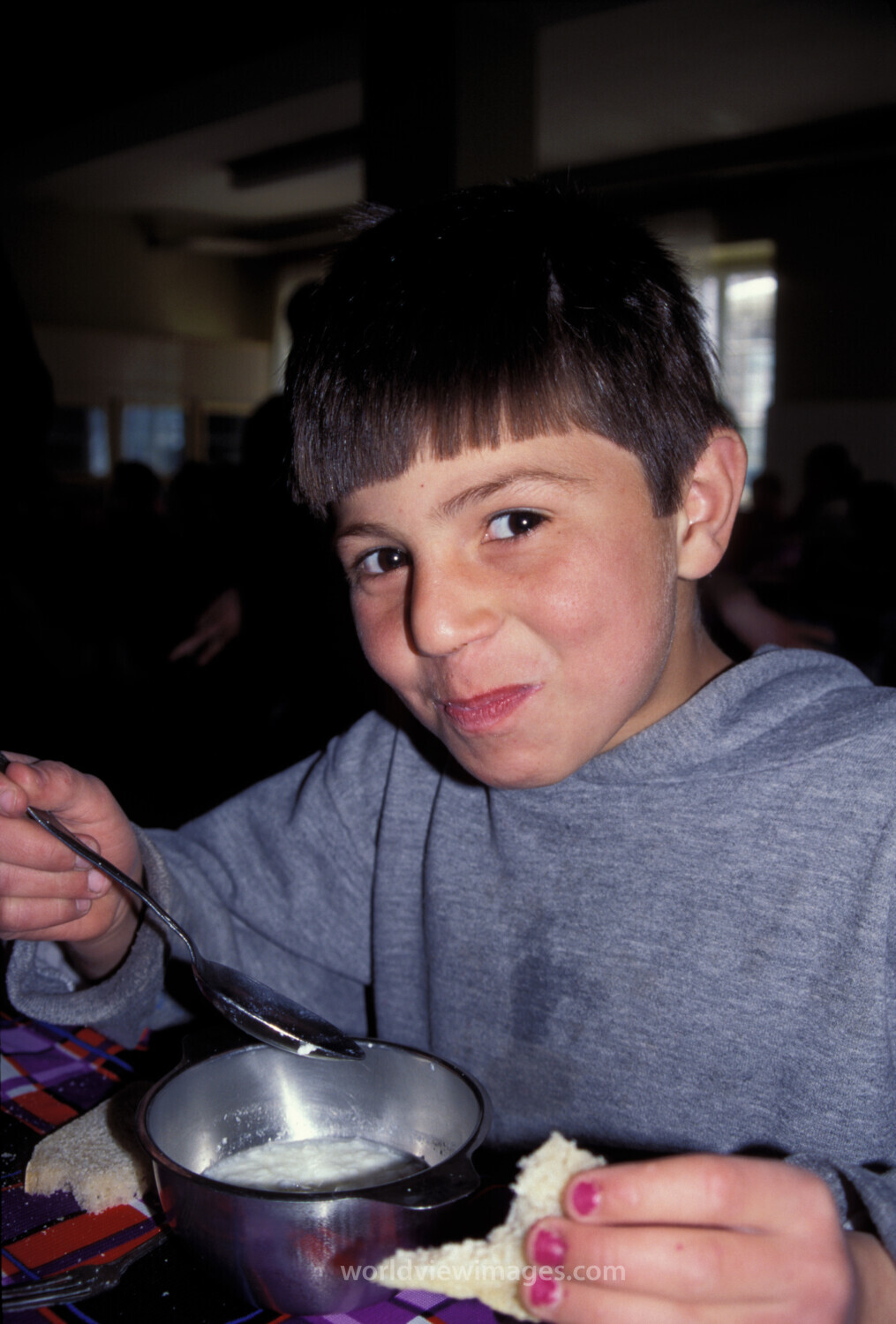 Orphans in Bosnia Eat Food provided by Canadian farmers.