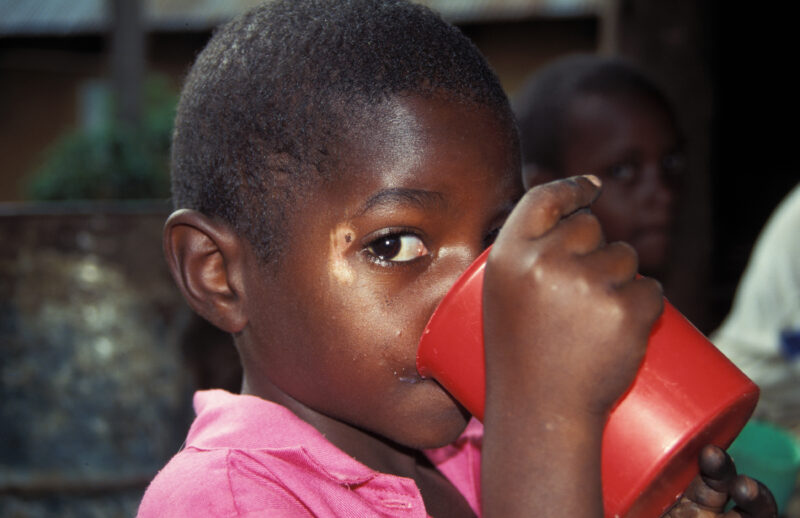 Boy in Kenya Drinks — Boy drinks water in Kenya, Africa — Africa, Kenya, child, children, drinking