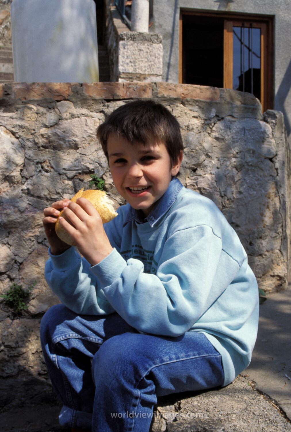 Orphans in Bosnia Eat Food provided by Canadian farmers.