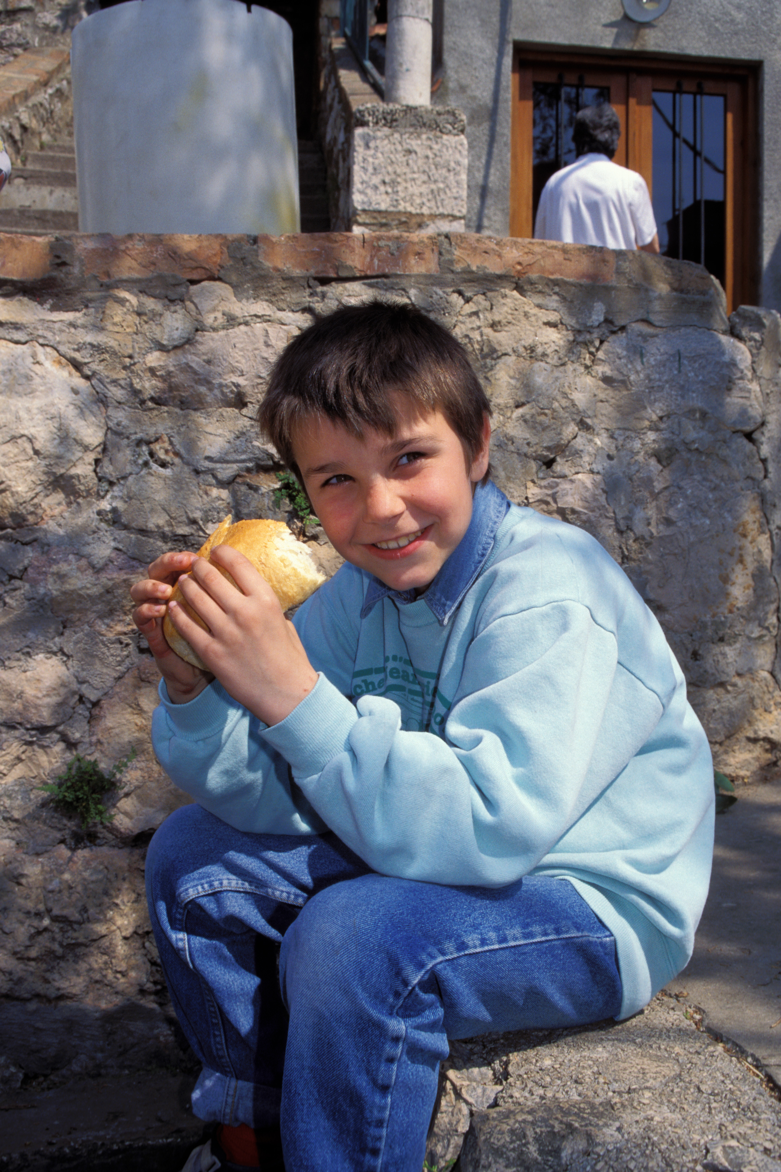 Orphans in Bosnia Eat Food provided by Canadian farmers.