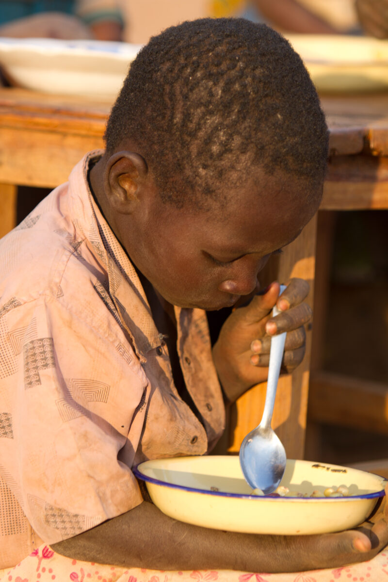 Eating Beans and Maize — Children eat a simple meal of beans and Maize, during a severe drought in Eastern Kenya — Children, eat, eating, meal, food