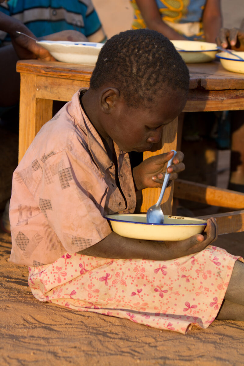 Eating Beans and Maize — Children eat a simple meal of beans and Maize, during a severe drought in Eastern Kenya — Children, eat, eating, meal, food
