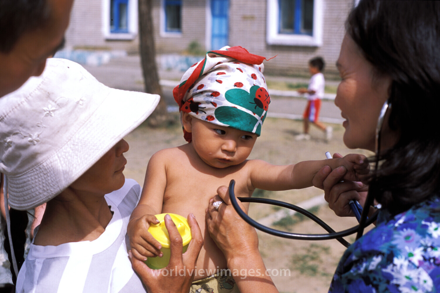 Doctor Checks Baby in Mongolia