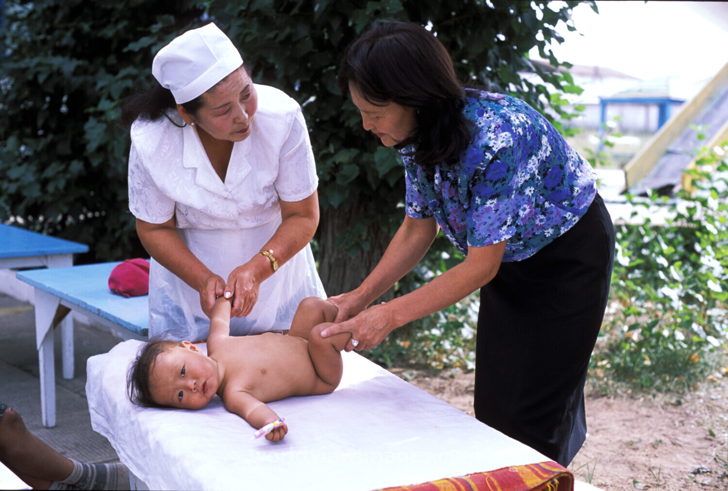 Doctor Checks Baby in Mongolia