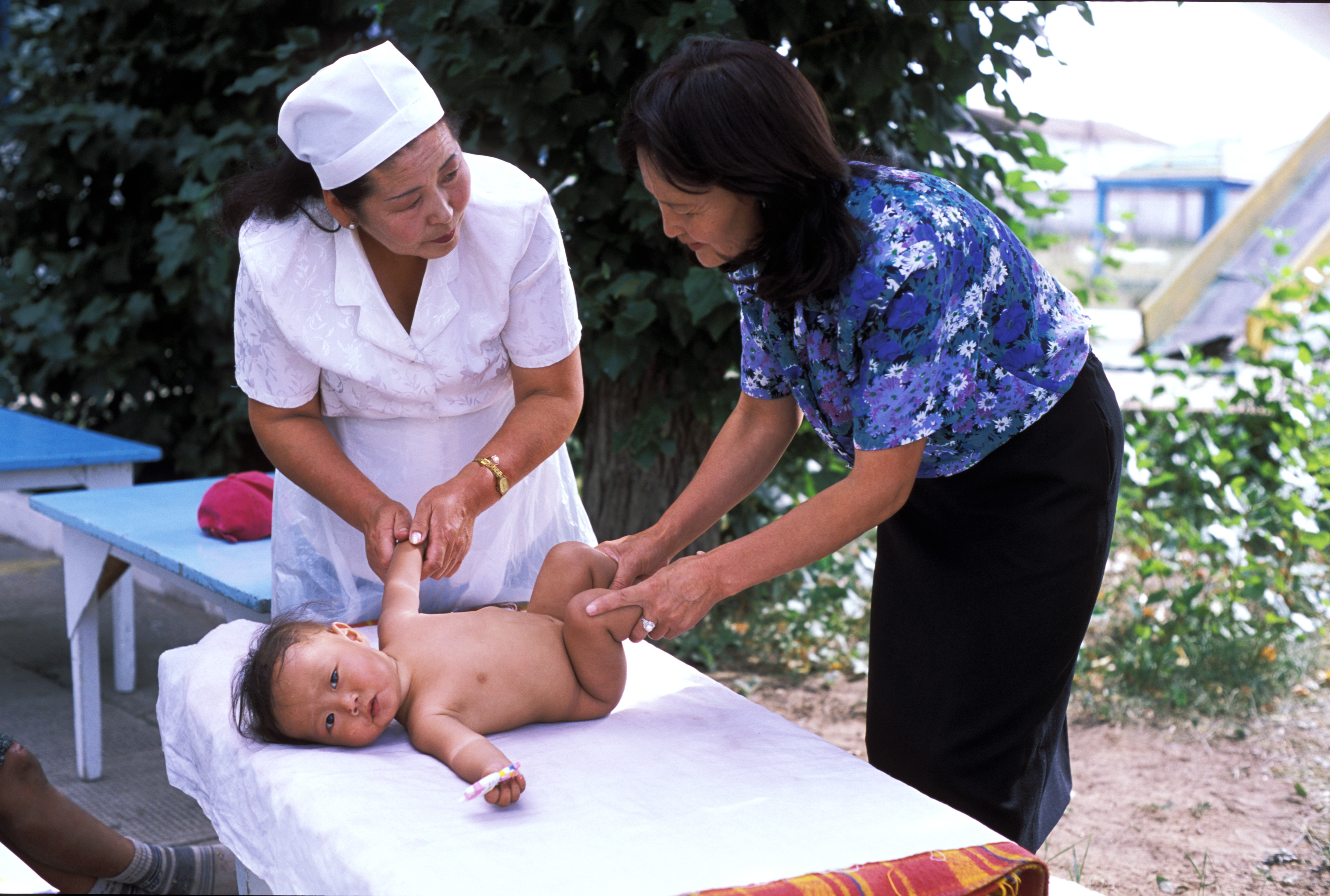 Doctor Checks Baby in Mongolia