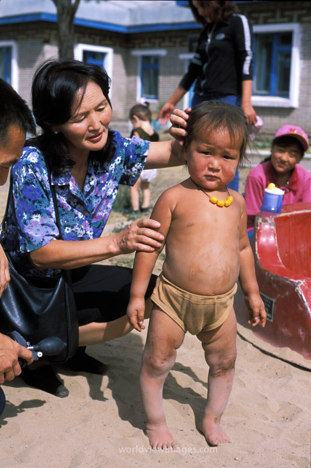 Doctor Checks Baby in Mongolia