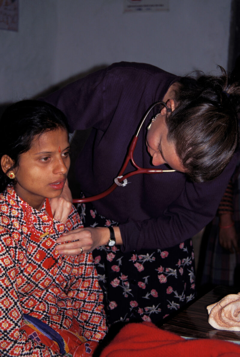 Checkup in Nepal — Stock Image of woman visiting the doctor at a ADRA mobile clinic in Rural Nepal — Nepal, Health, Clinic, Doctor, Woman