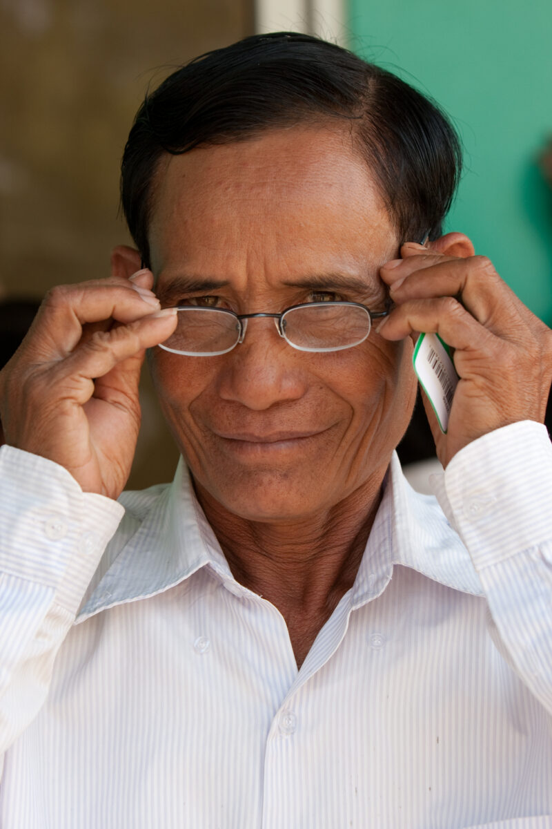 Getting New Glasses in cambodia — People get new sight with glasses from the US at a Free Clinic in cambodia — Cambodia, health, eye, eyes, exam