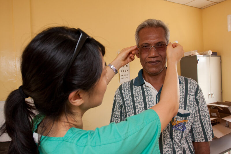 Getting New Glasses in cambodia — People get new sight with glasses from the US at a Free Clinic in cambodia — Cambodia, health, eye, eyes, exam